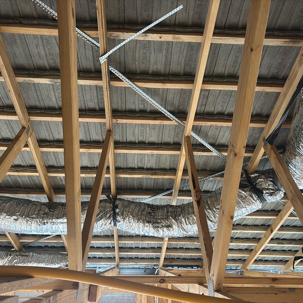 Sarking not installed beneath the tiled roof at lock-up stage, found during a lock-up inspection in Werribee