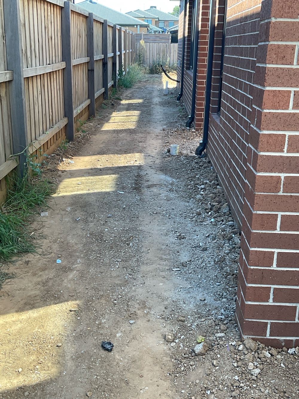 Ground beside the slab not yet graded to carry rainwater away, Werribee