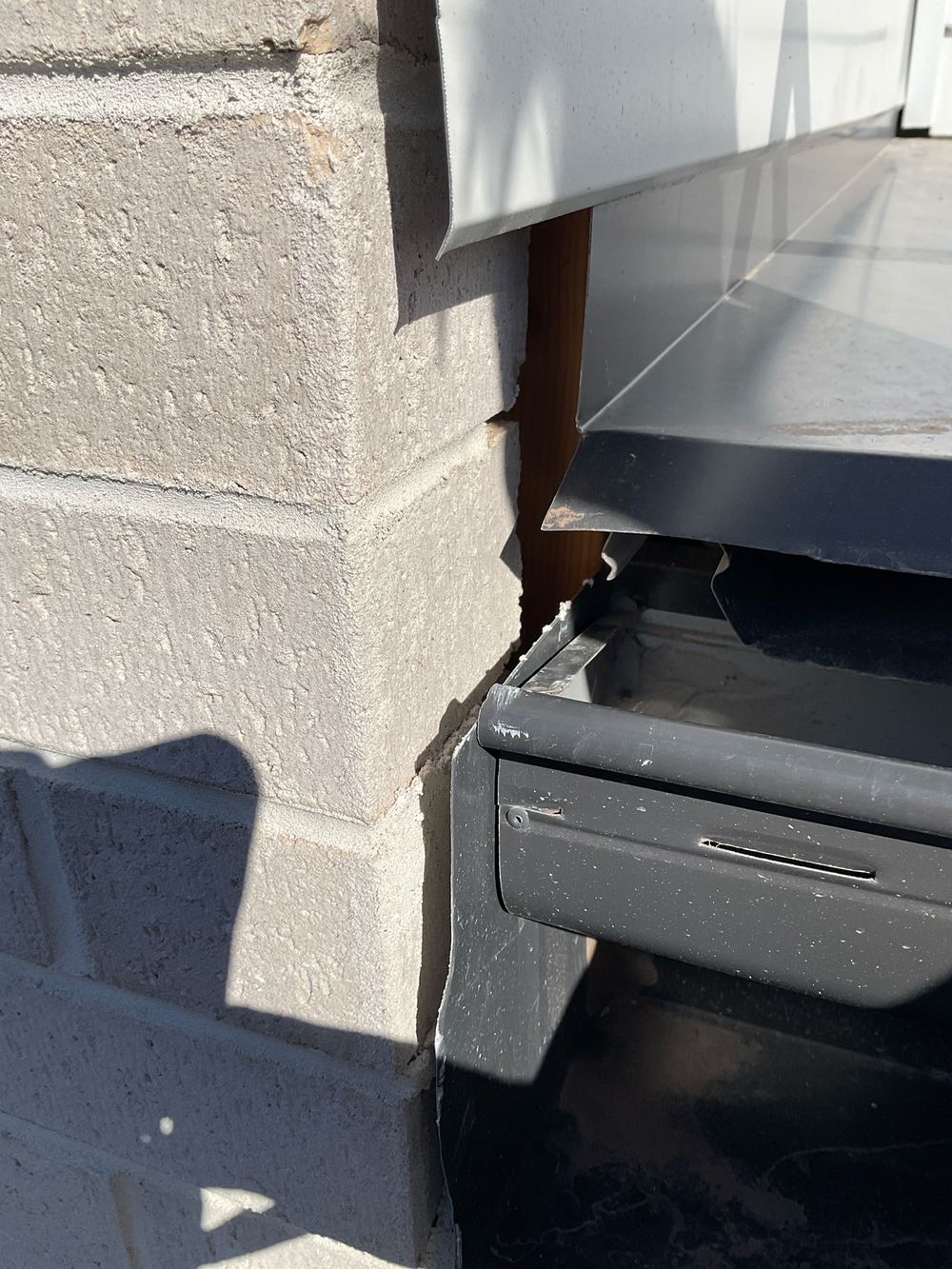Roof flashing poorly fitted, leaving gaps where water can get in, found during a pre-handover inspection in Werribee